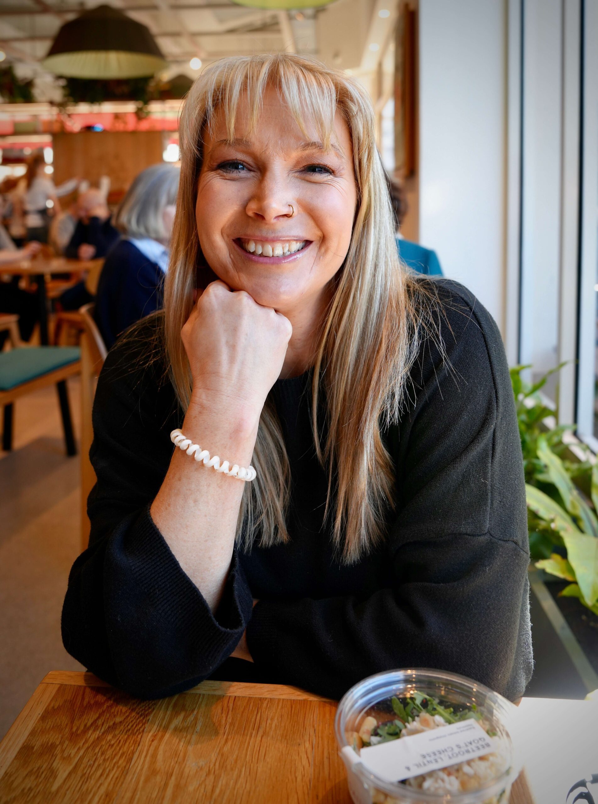 Pregnancy and Eating Disorder Recovery – A Journey of Strength and Self-Compassion Pregnant woman smiling in nature, symbolising strength and vulnerability during eating disorder recovery in pregnancy