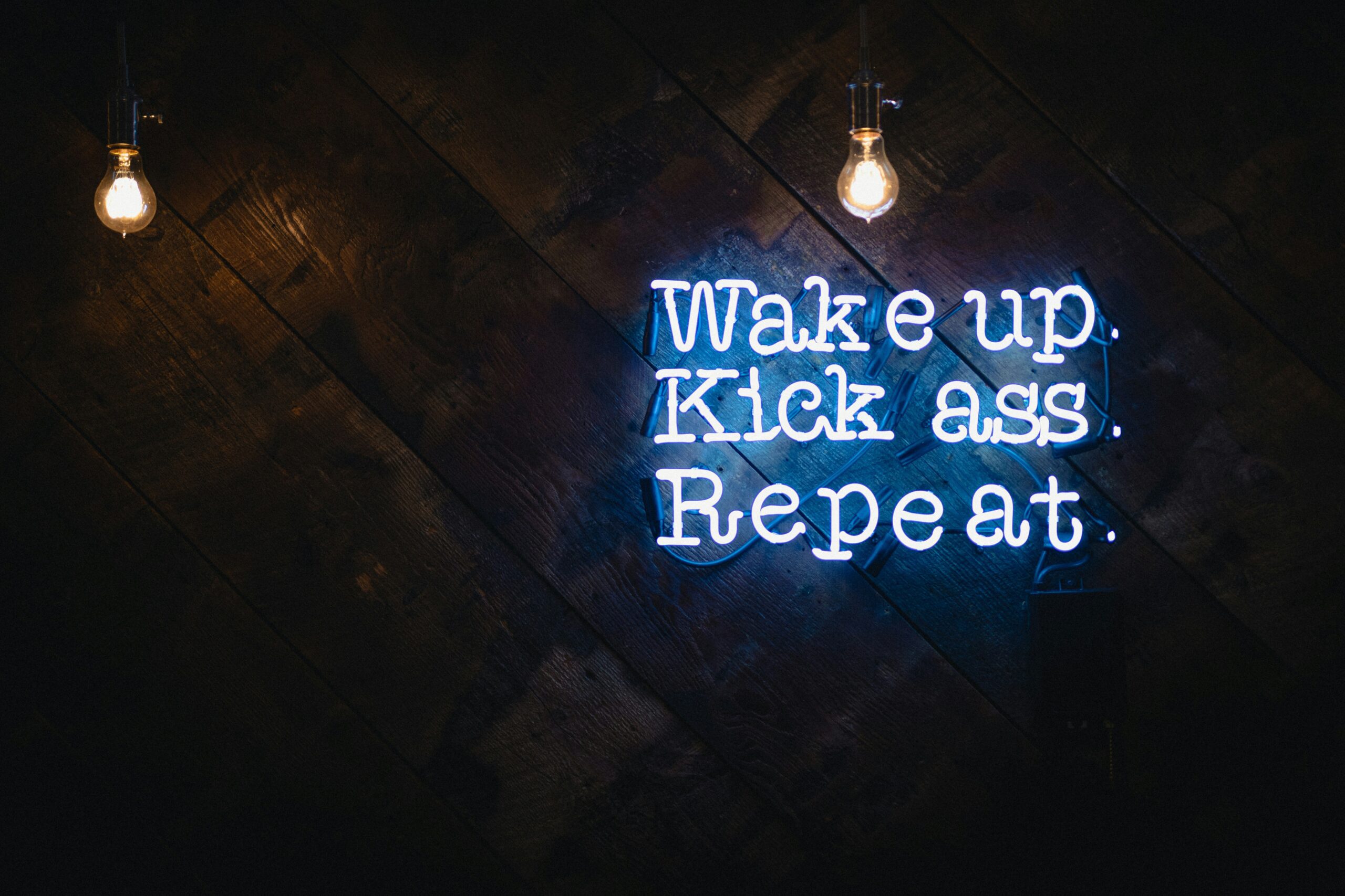 ADHD Motivation Support Canterbury – Wake Up Kick Ass Repeat Motivational quote graphic used in blog about ADHD burnout recovery and executive dysfunction support in Canterbury