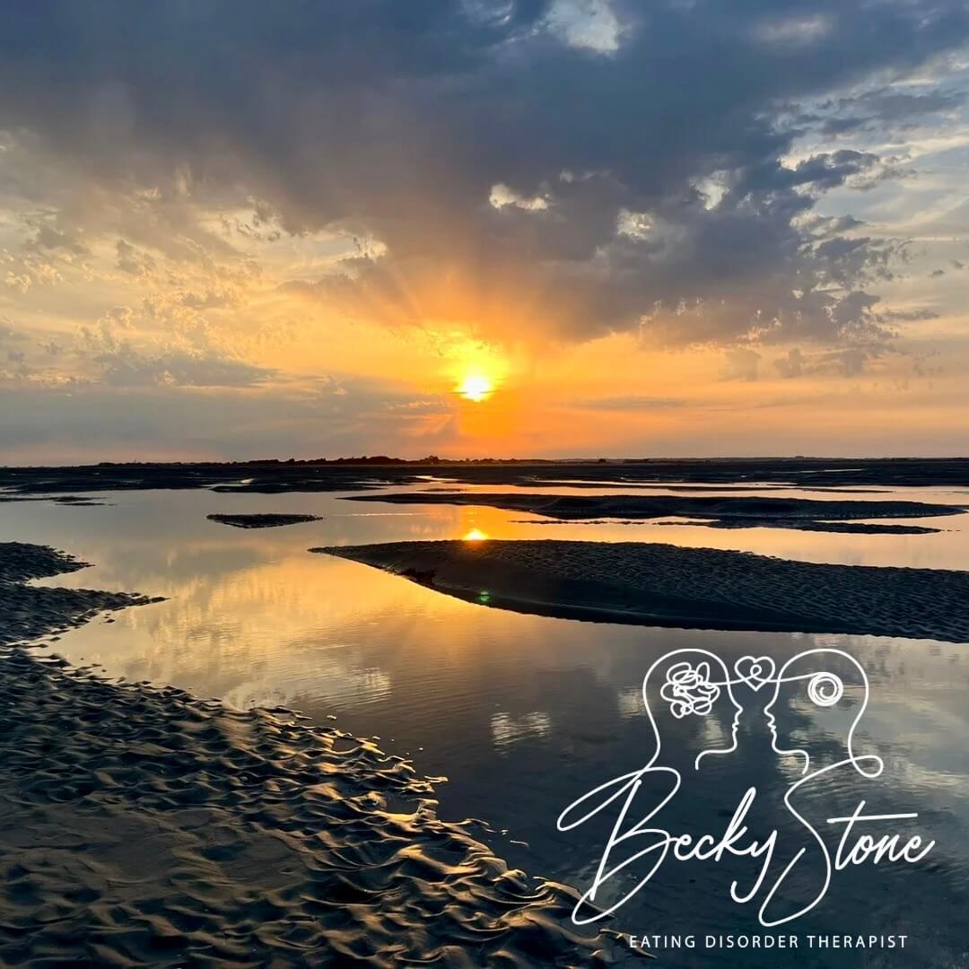 ADHD Diagnosis and Self-Acceptance | Becky Stone Sunset over the coast representing reflection, self-acceptance and emotional healing after an adult ADHD diagnosis